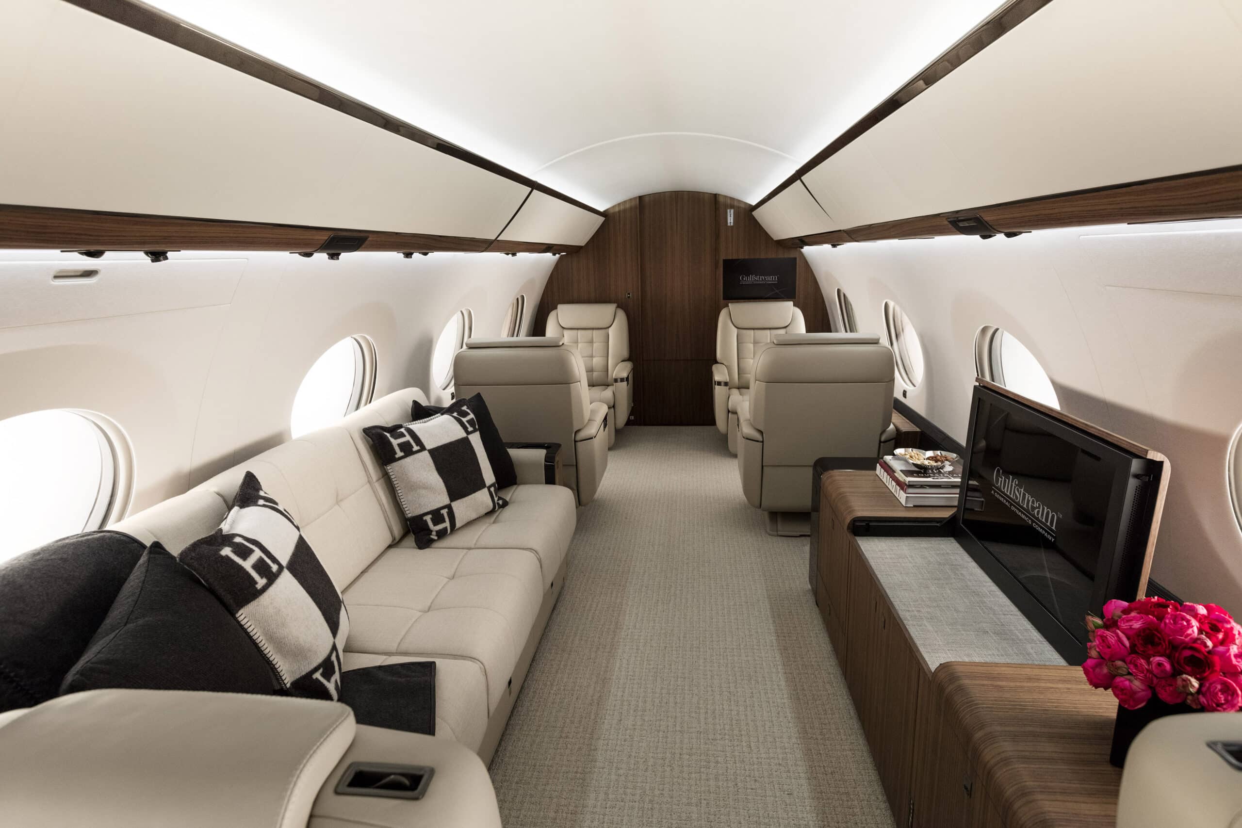 Executive private jet cabin interior with club seating